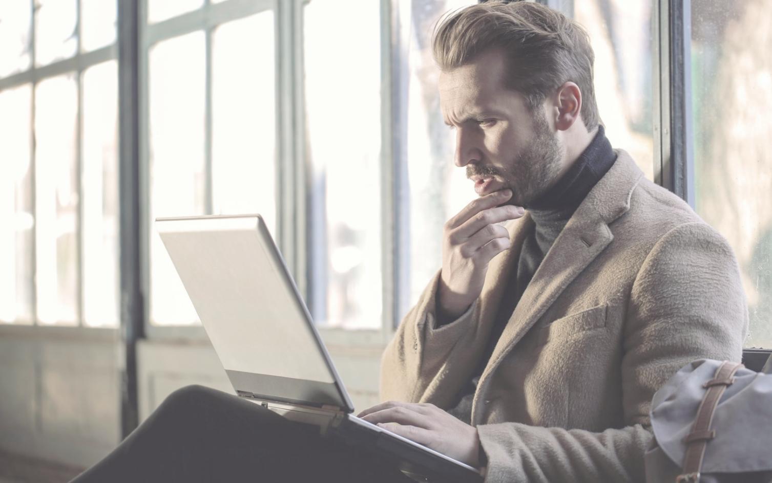 Collaborative workspace showing team members discussing system optimization strategies