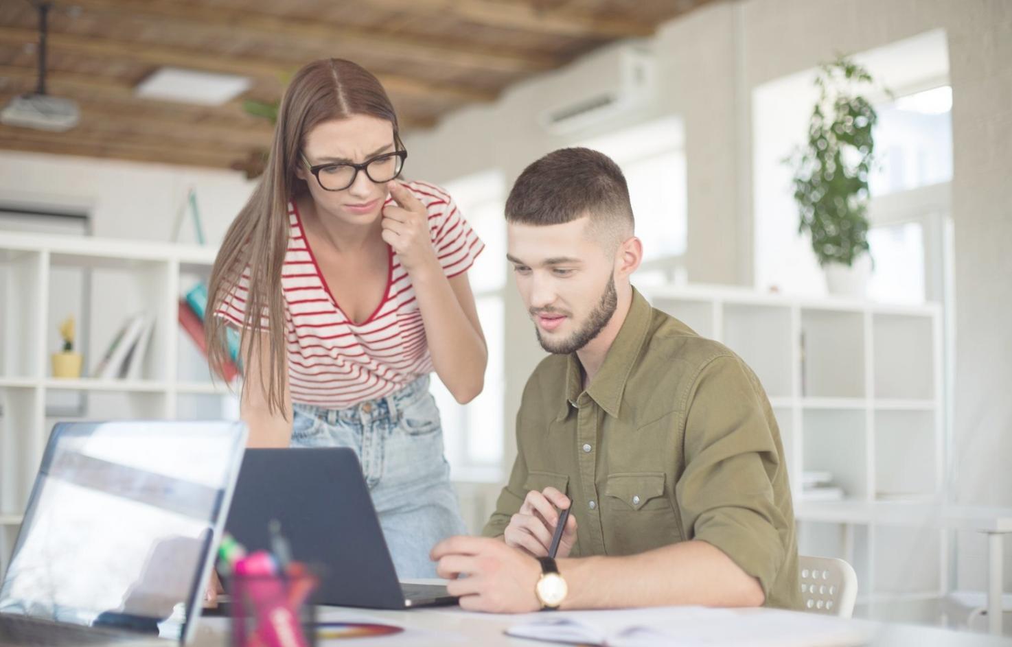 Workshop participants collaborating on system architecture diagrams